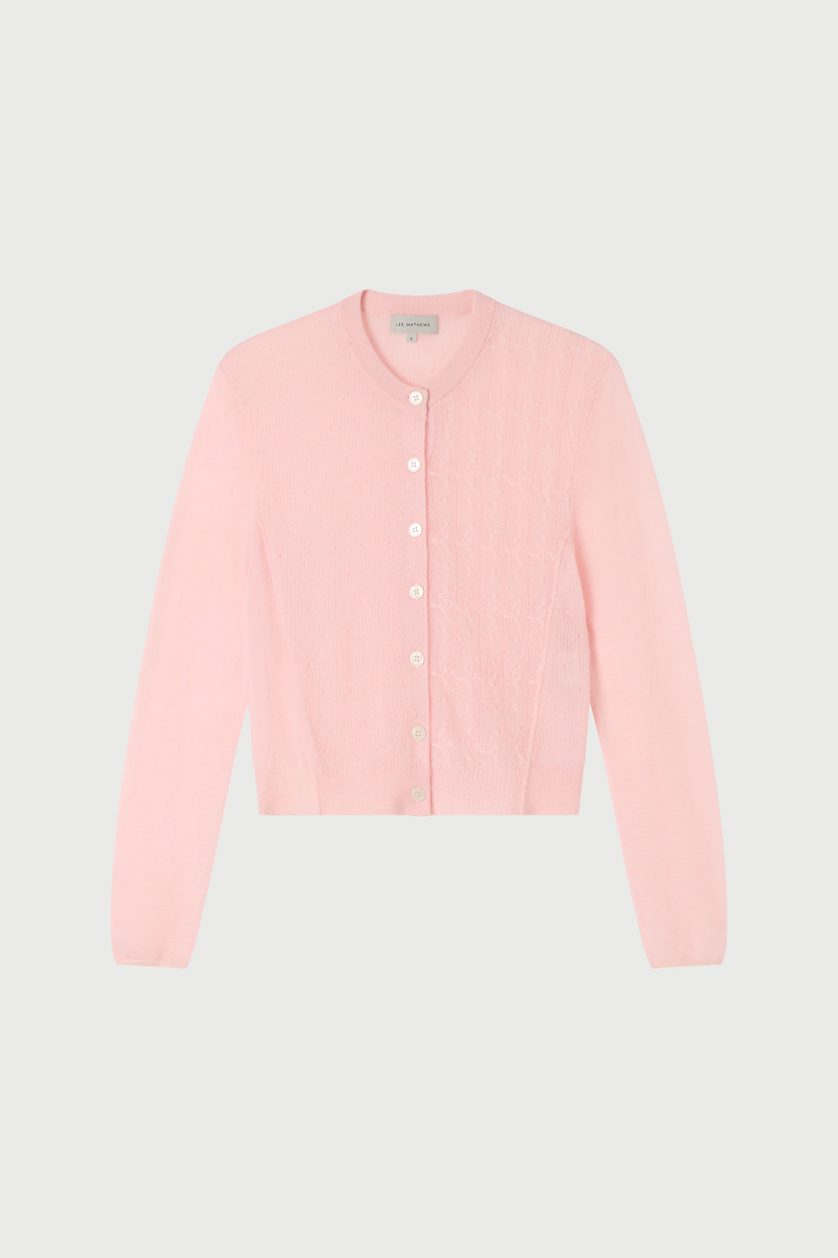 Light pink cardigan on a light gray background