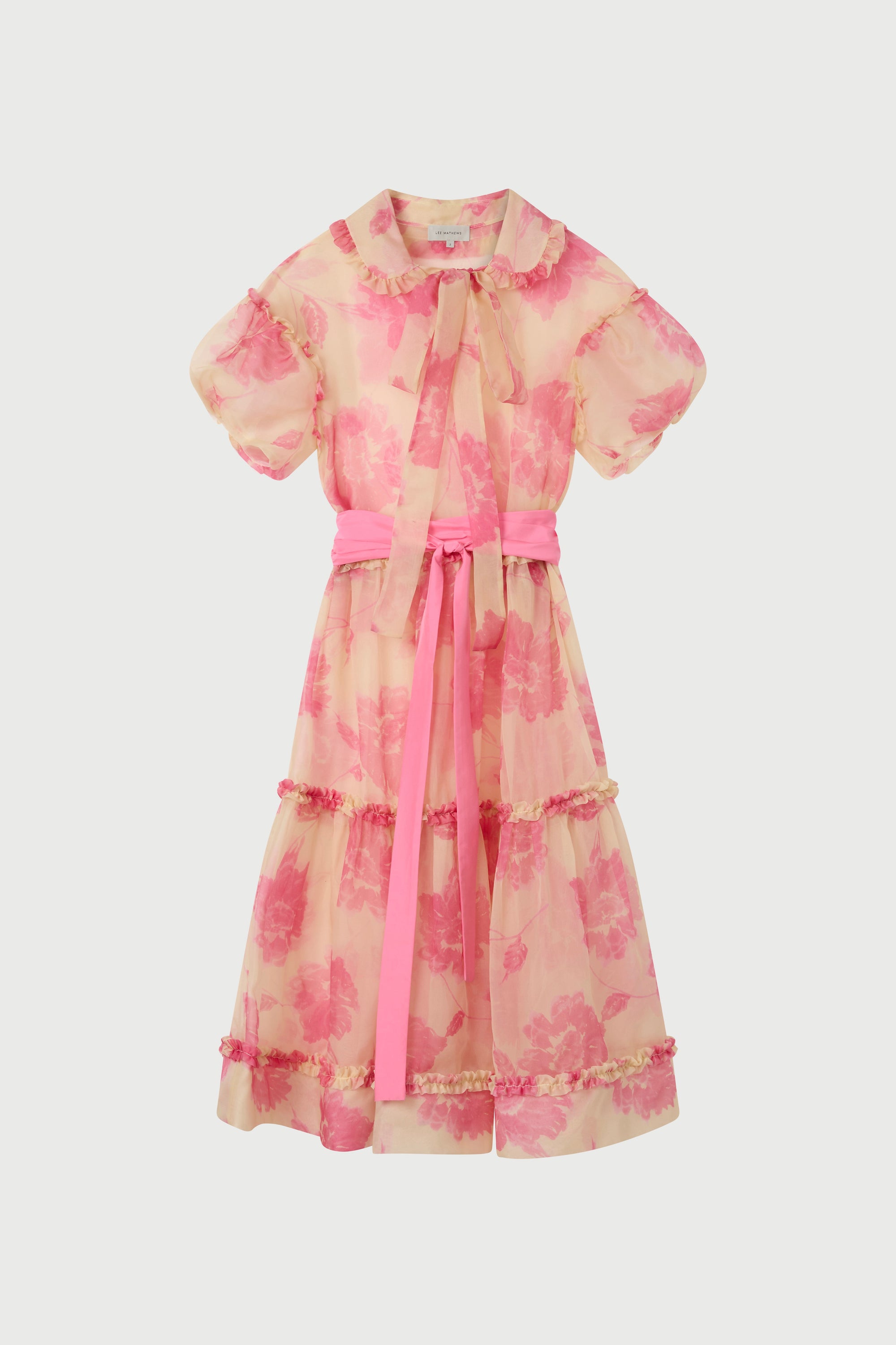 Pink floral dress with a belt on a white background