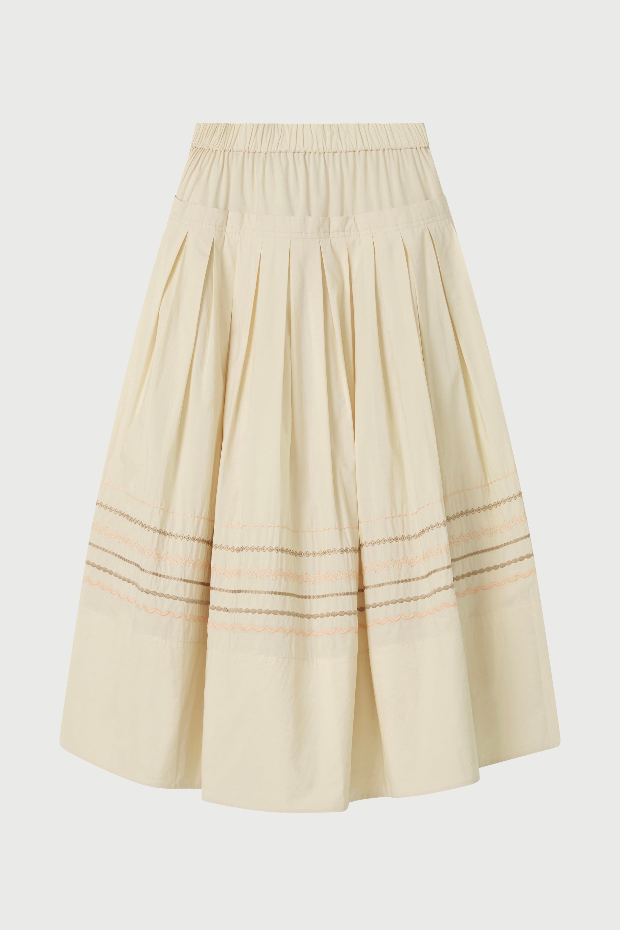 Beige pleated skirt on a white background