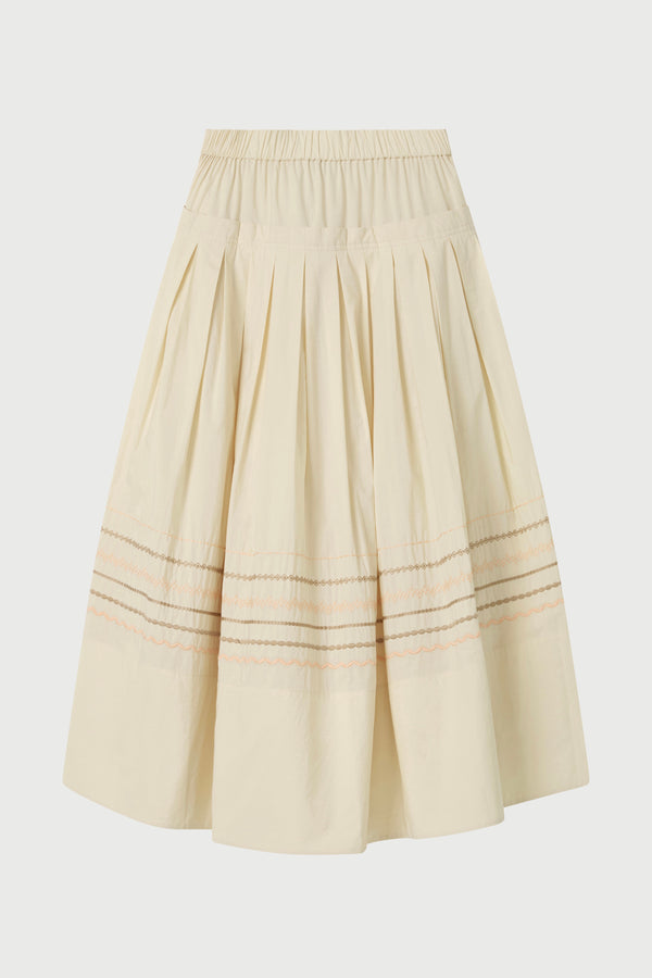 Beige pleated skirt on a white background